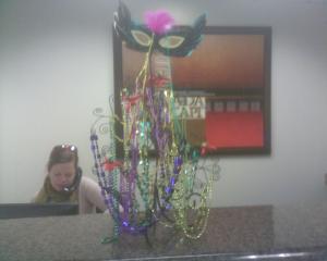We made a Mardi Gras tree with beads, crawdads & a mask.