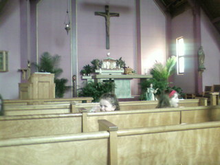 In church for my niece's pre-school graduation. That's her mugging for the camera.