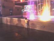 Little kid braving the sitcom theme song fountain barrage