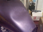 Tank dent: before