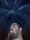 abandoned bar umbrella saves the day (and the electronics)
