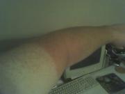 No, that's not a shadow. Someone got a sunburn today!